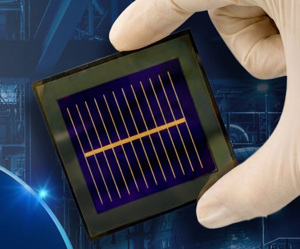 Close-up of advanced two-layer perovskite-silicon tandem solar cell showing reflective surface texture