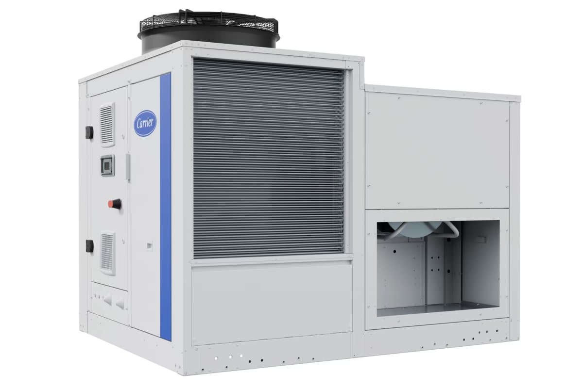 Modern rooftop heat pump unit installed on commercial building under blue sky