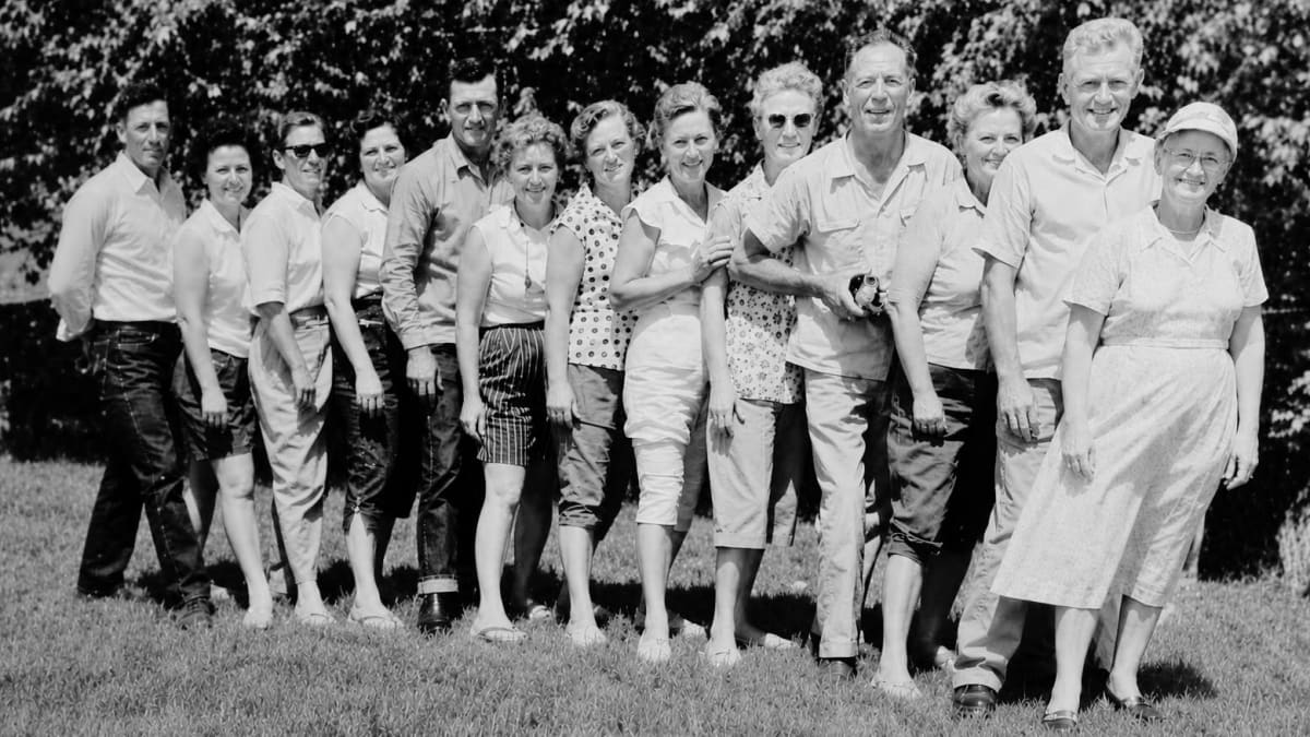 Multi-generational Texas family gathered outdoors celebrating 80 years of annual reunions together
