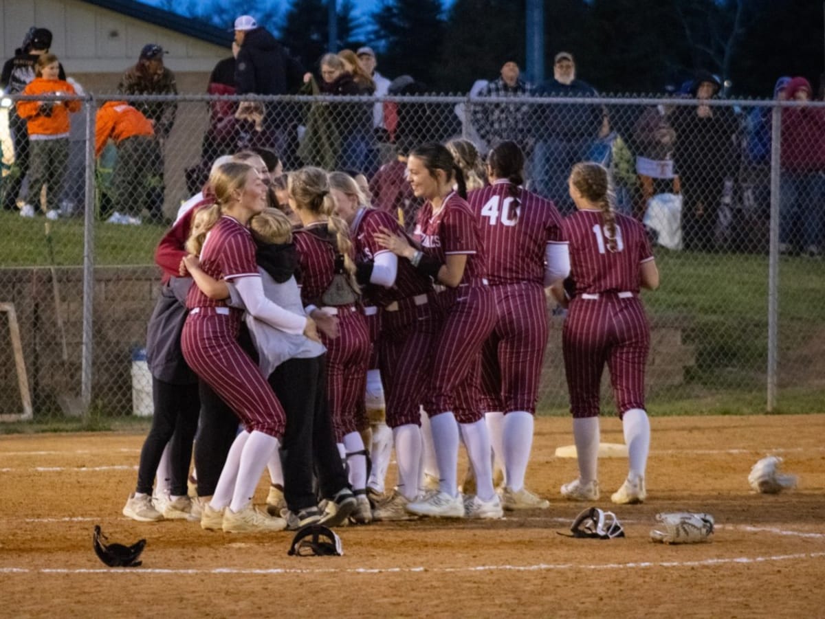 Pine Grove Cardinals softball players celebrate together after winning the 2026 Schuylkill League Championship