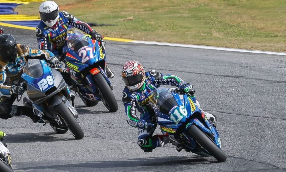 Kevin Olmedo racing his Suzuki motorcycle at Road Atlanta during MotoAmerica competition