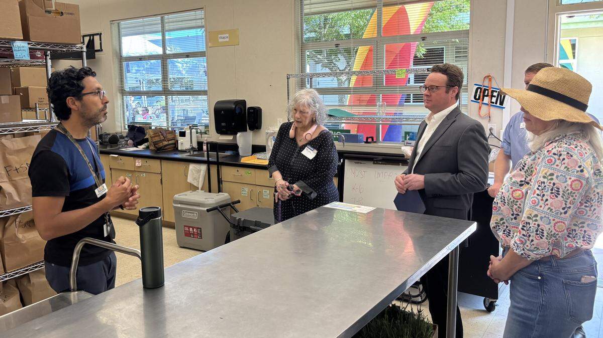 Volunteers and staff gather at Community Food Connections office to support Sacramento student food program