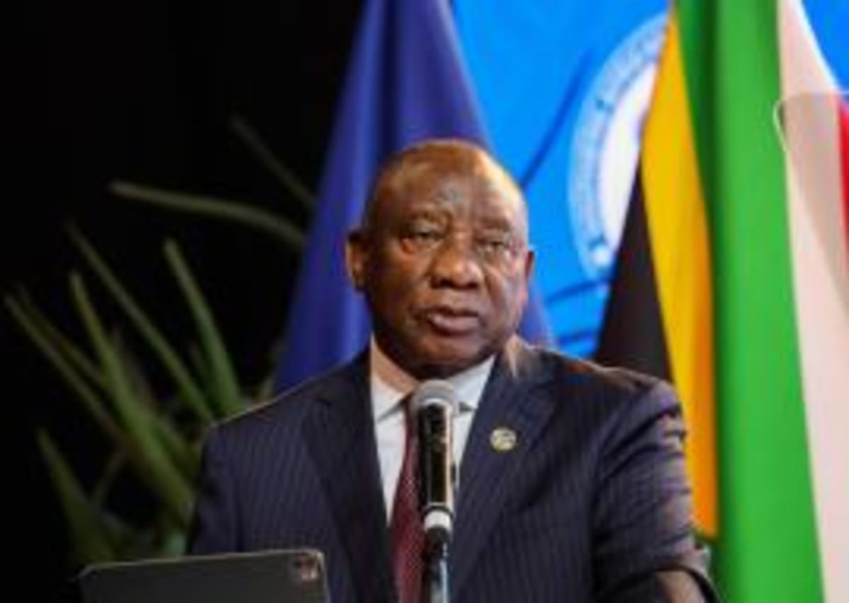 Southern African leaders gathered at conference table with national flags during SADC Summit in Durban