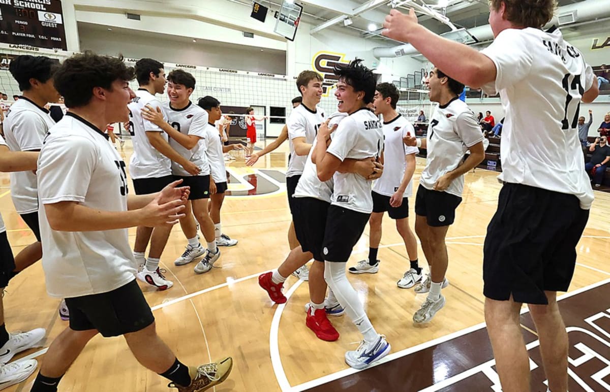 Santa Cruz High volleyball players celebrating on court after winning first CCS championship