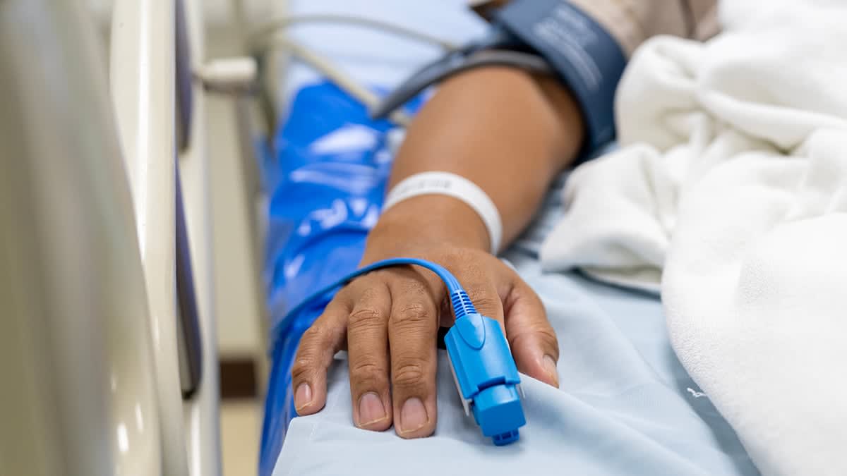 Medical professional holding test tubes for new colorectal cancer blood screening test