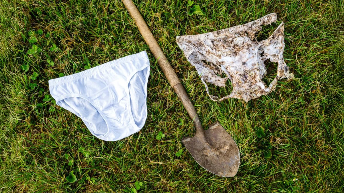 Side-by-side comparison showing new cotton underwear next to partially decomposed underwear after two months underground