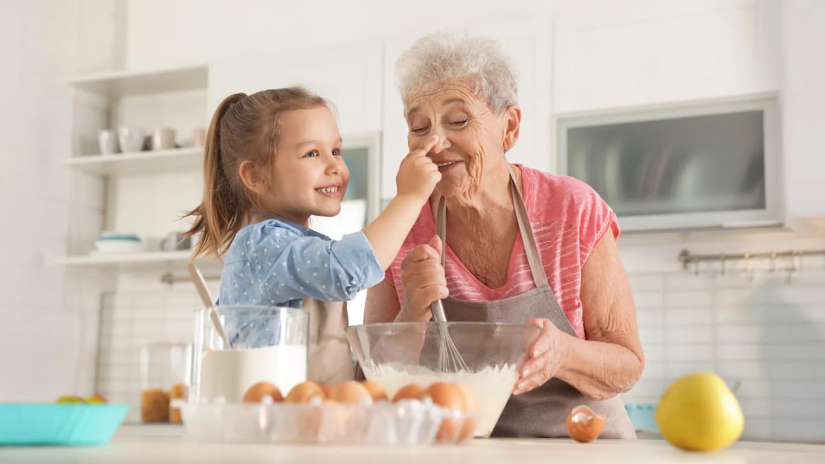 Grandparent and grandchild having a warm conversation together, sharing quality time and emotional connection