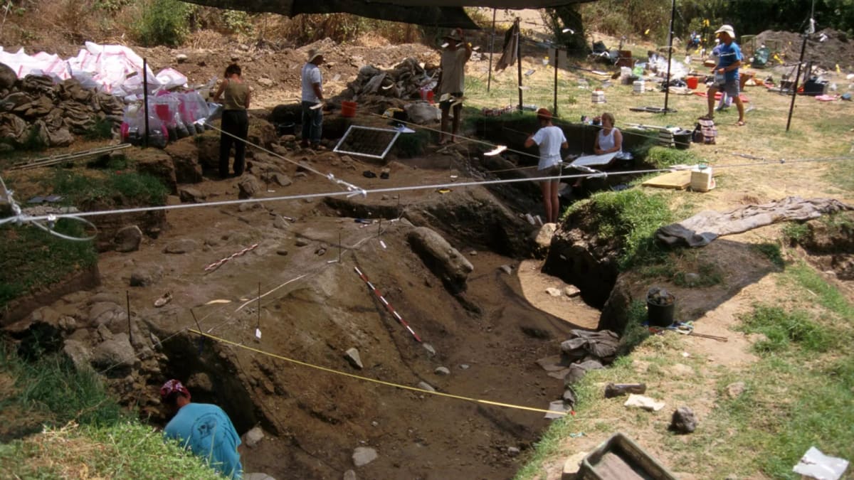 Archaeological excavation site at Gesher Benot Ya'aqov showing ancient layers where early humans gathered