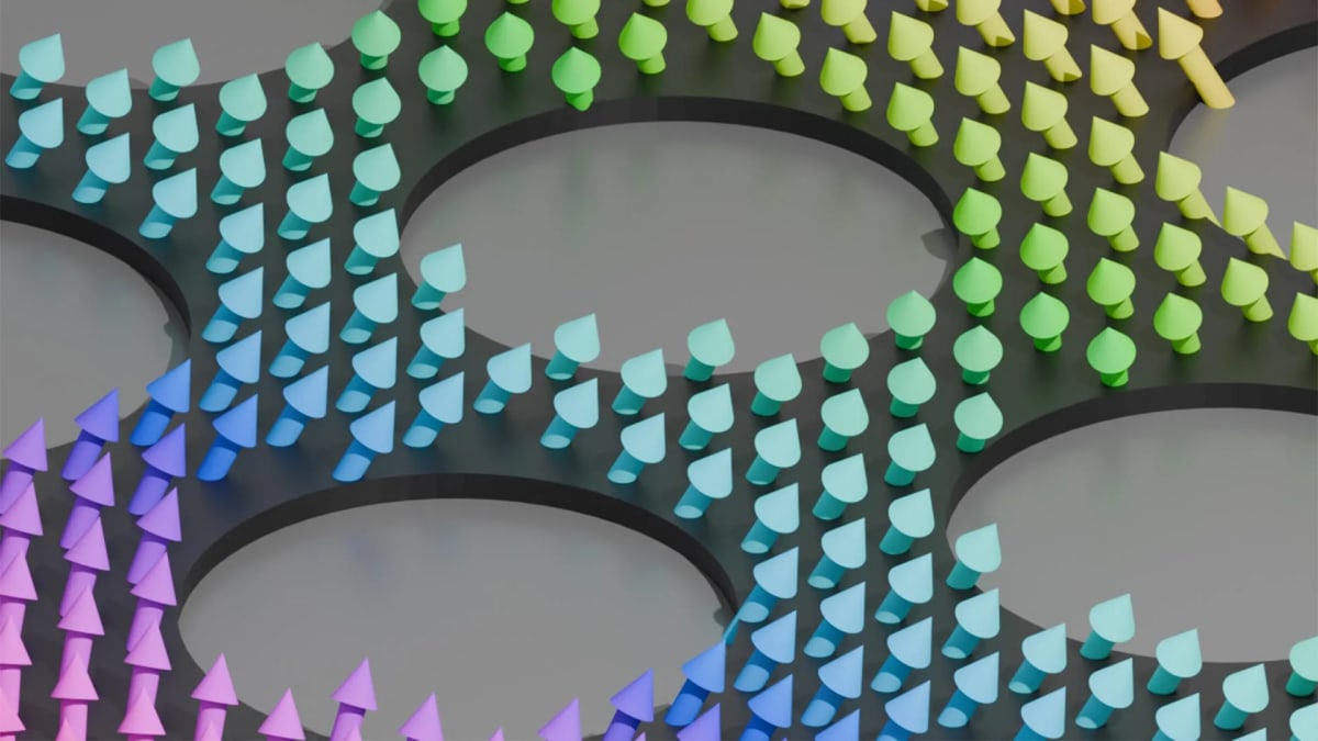 Visualization of magnetic spin waves traveling across hexagonal patterned thin film material