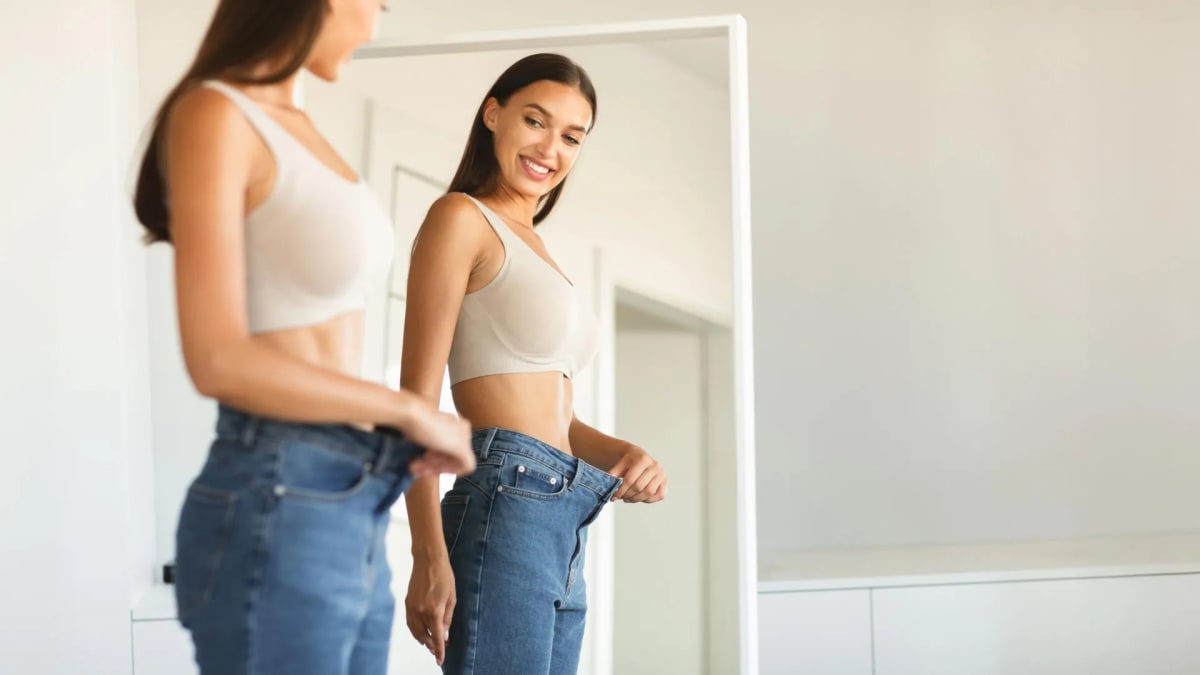 Scientists examining molecular structures on computer screens in modern research laboratory