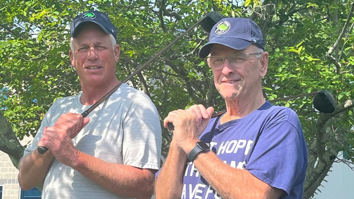 Golfers at Pease Golf Course participating in Jimmy Fund Classic charity tournament for childhood cancer research