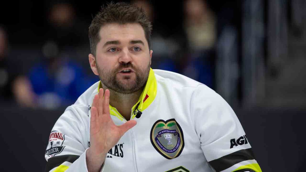 Canadian curling skip Matt Dunstone celebrates during world championship match against China