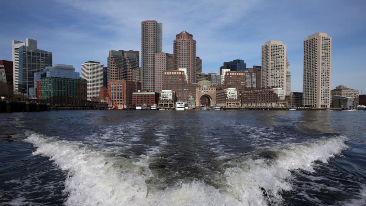 Boston skyline showing laboratory buildings where biotech companies develop medical treatments and therapies
