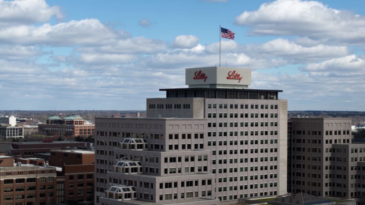 Eli Lilly pharmaceutical building exterior showing company logo and modern architecture