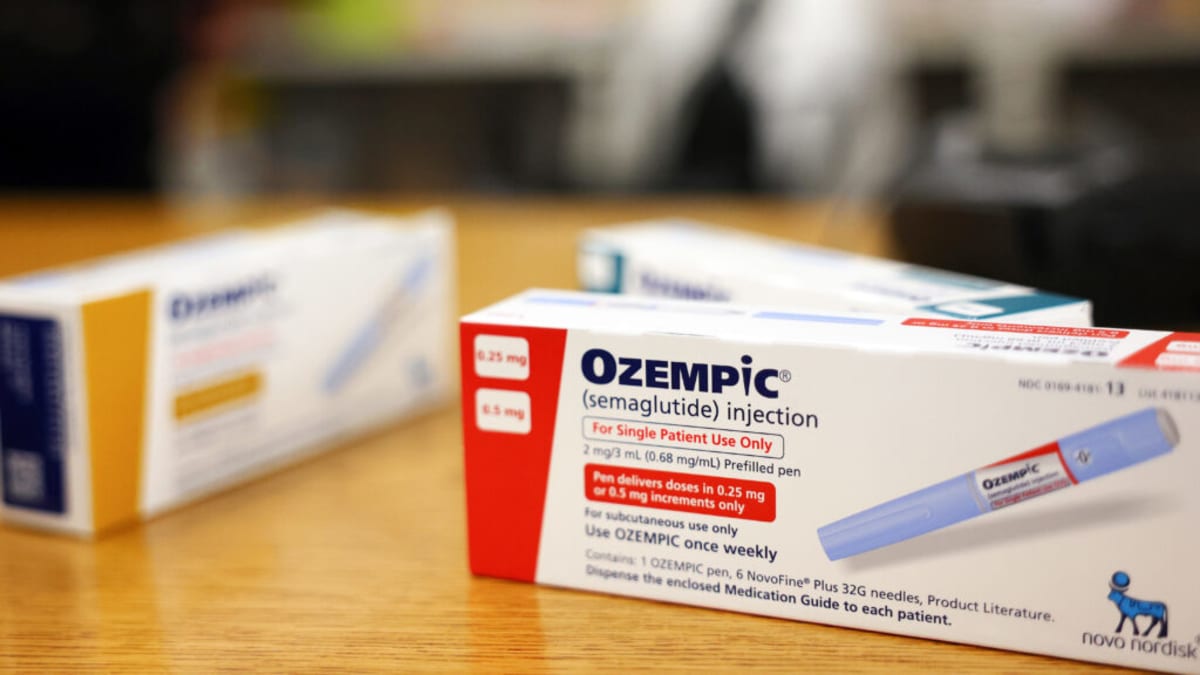 Ozempic medication pen and packaging on table representing affordable diabetes treatment access
