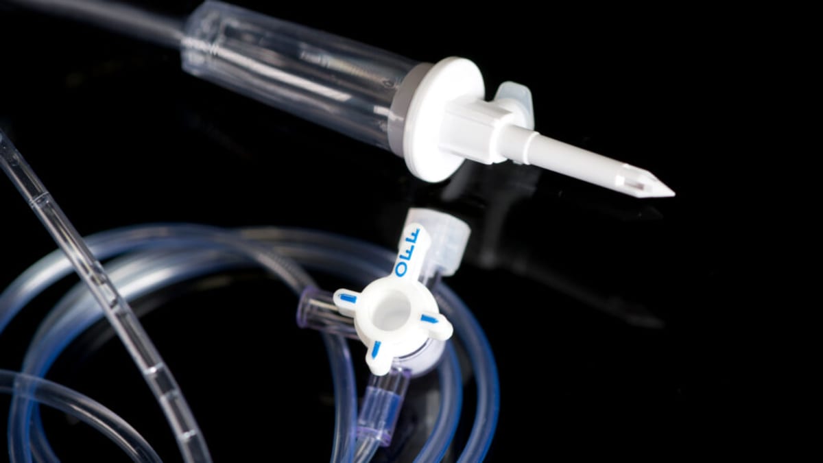 Medical researchers in laboratory working on rare disease treatments and enzyme replacement therapy