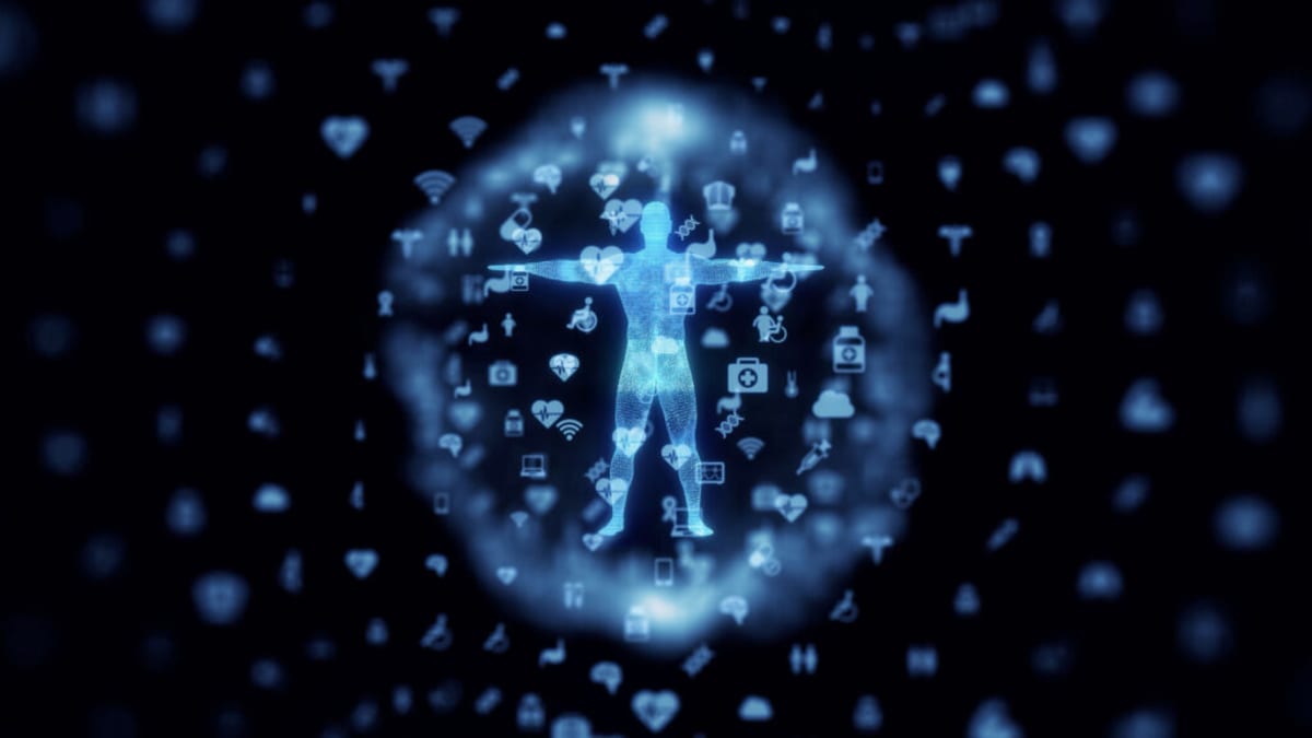 Healthcare worker helping senior patient use digital health technology on tablet device