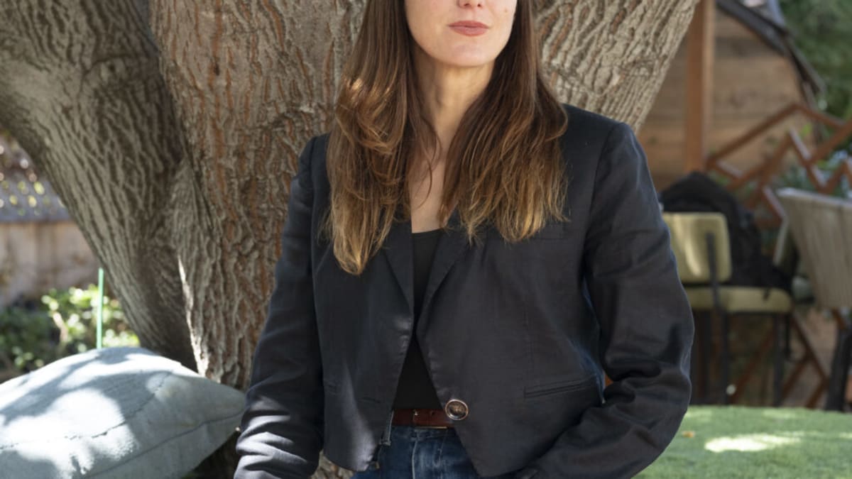 Researcher Jamie Justice speaking at longevity conference about anti-aging science competition