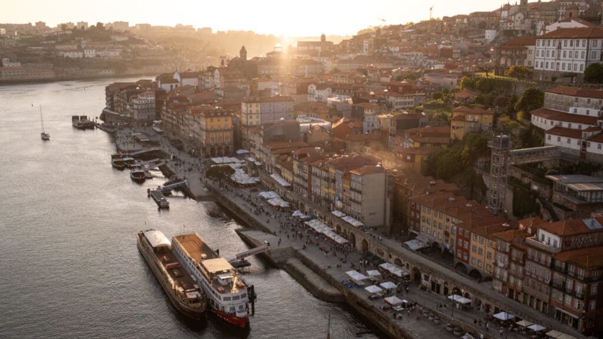 Aerial view of Porto, Portugal along the Douro River with historic buildings