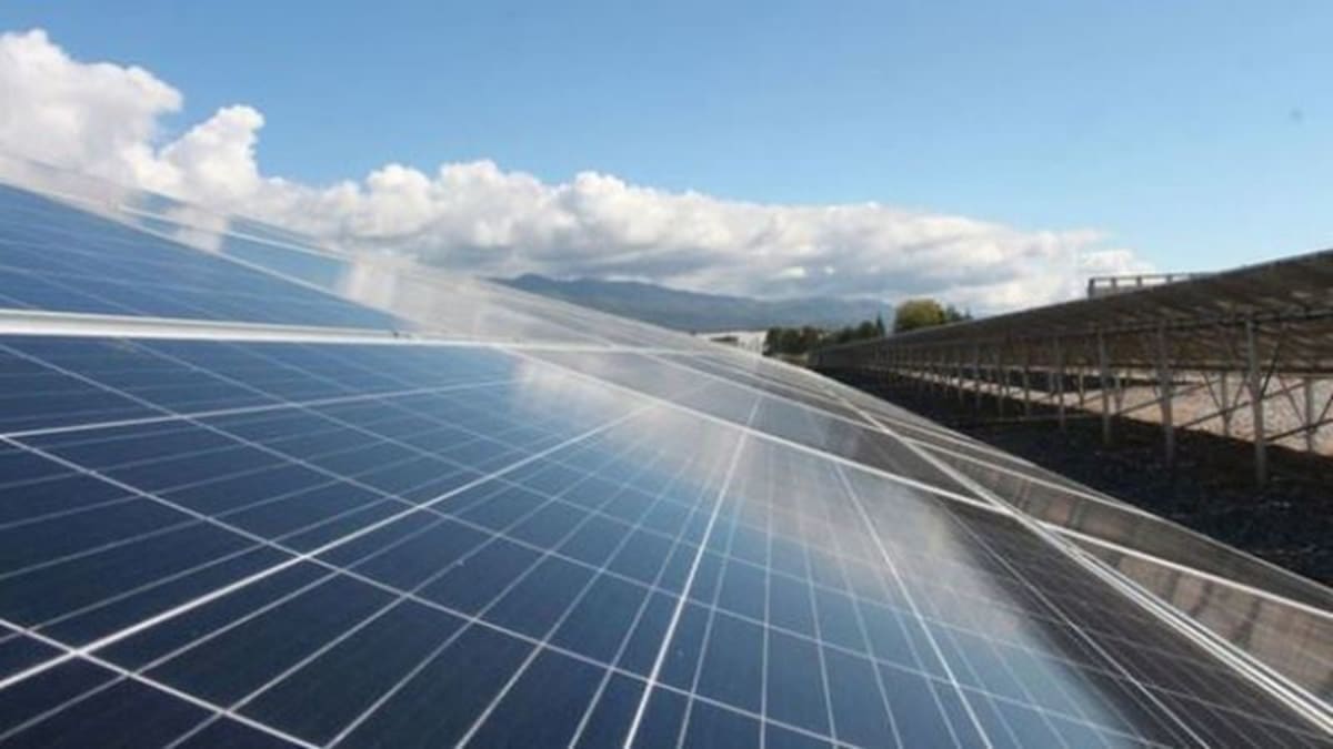 ** Solar panel arrays gleaming under bright Turkish sunshine generating clean renewable electricity