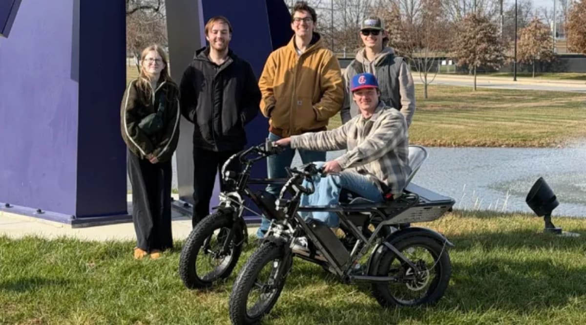 Vhan McGuire using The Chariot all-terrain wheelchair outdoors at Tennessee Tech University
