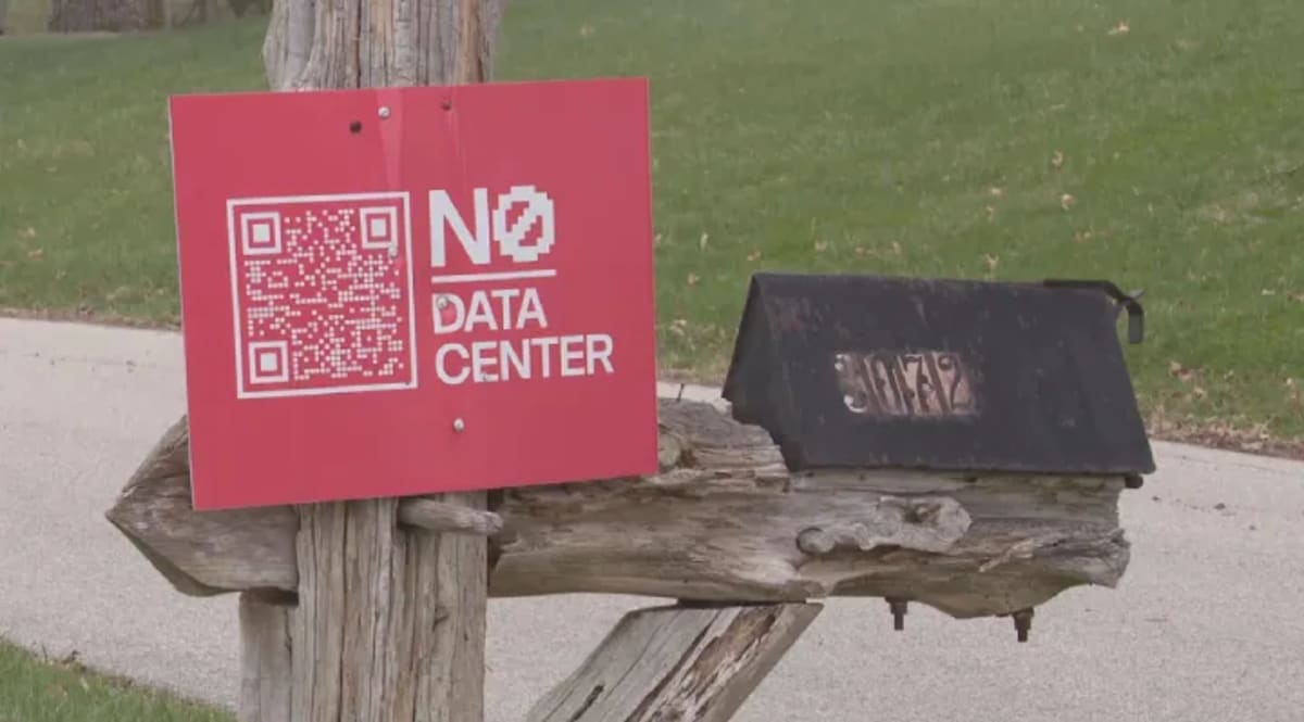 Elderly Kentucky farmer Ida Huddleston and daughter Delsia Bare standing in their family farmland with cattle