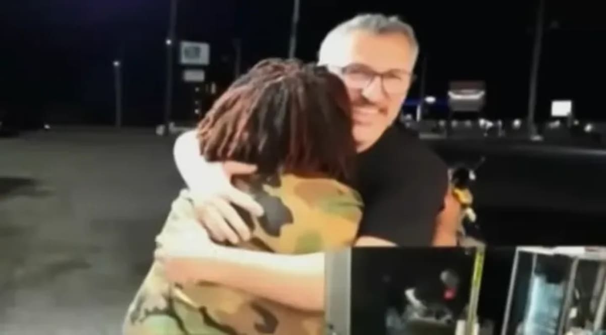 Pastor Tonya Gray speaking with food truck vendor Muhsin Sarac in Baltimore