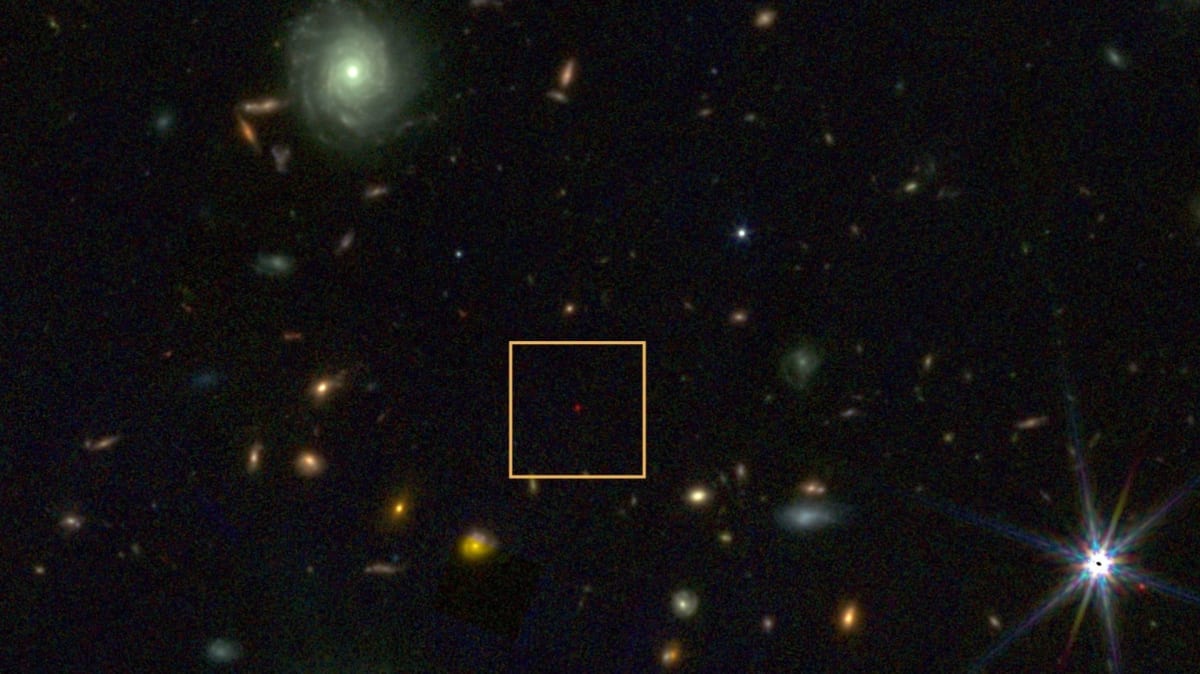 James Webb Space Telescope image showing mysterious Little Red Dots in deep space with one highlighted