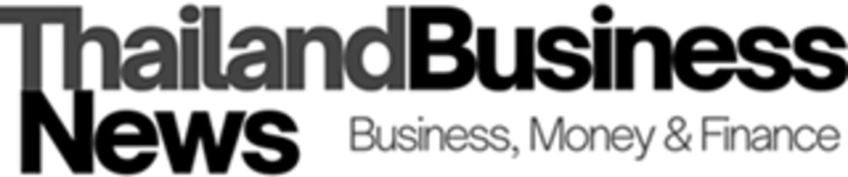 Students collaborate on technology project in modern Singapore university classroom setting