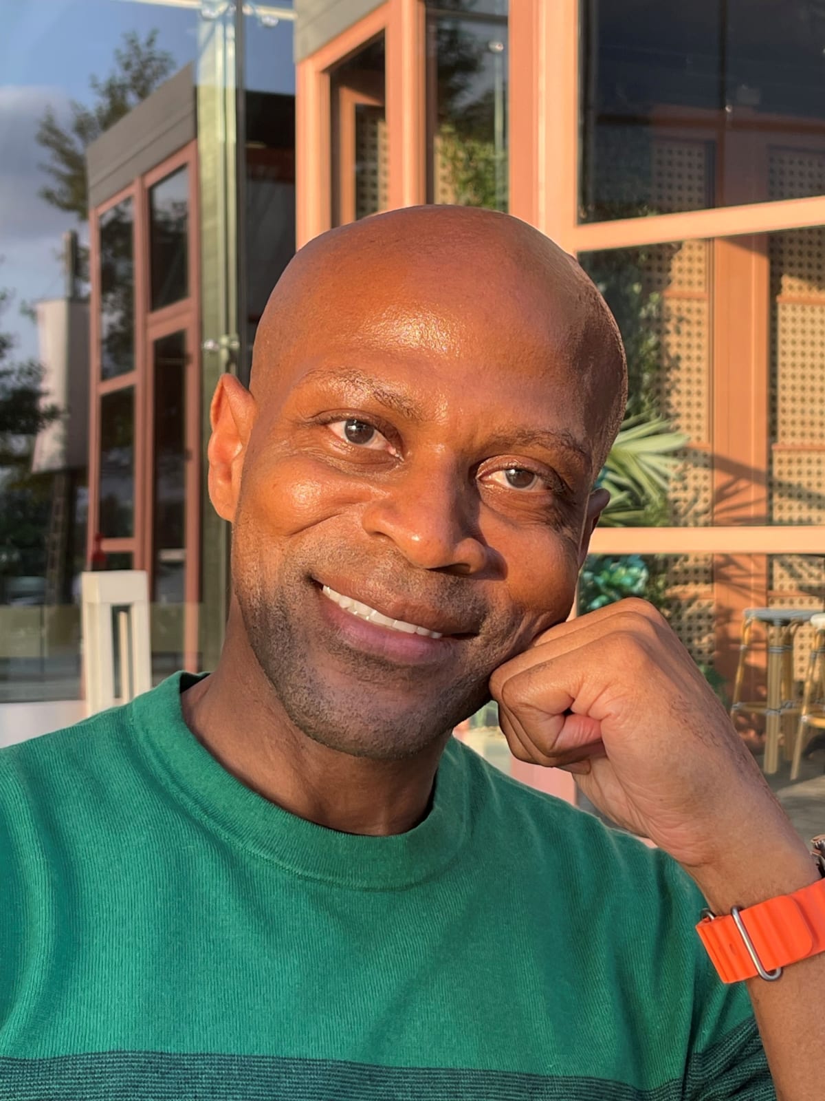 Tony Newberne, Charlotte personal trainer and multiple myeloma survivor, smiling confidently after beating cancer