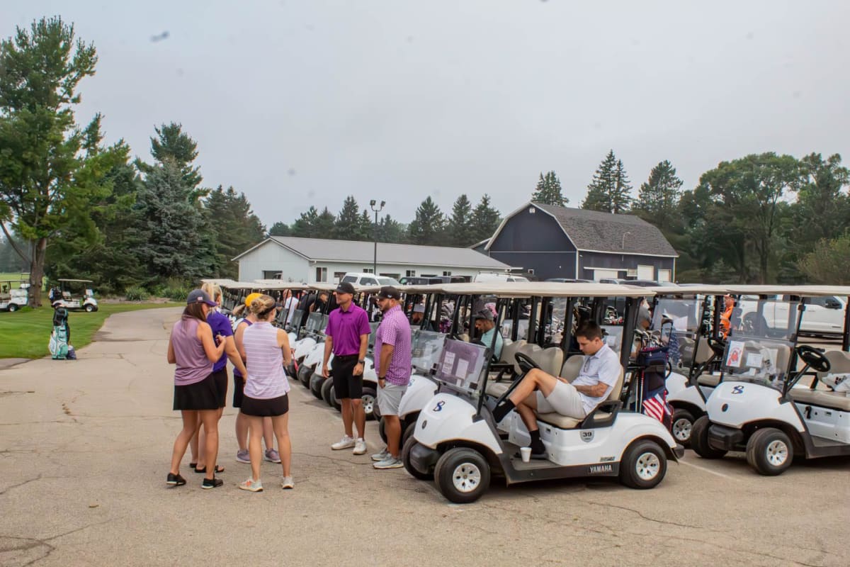 Golfers gathered at Brookside Golf Course supporting Greenville Yellow Jackets basketball programs fundraiser