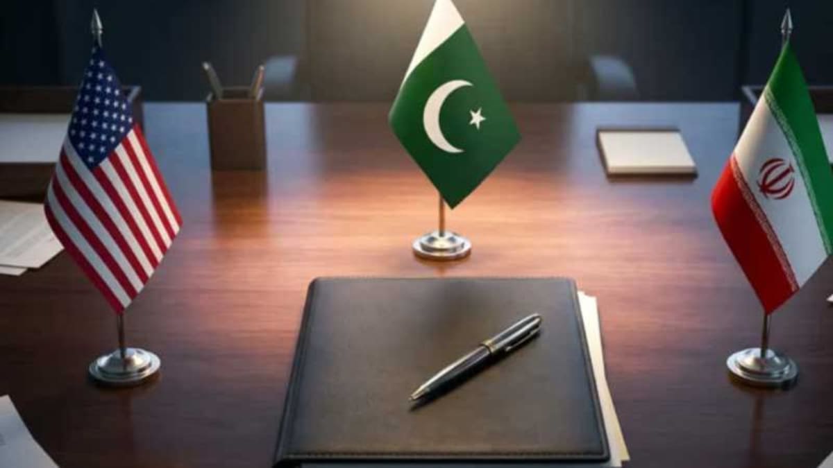 Pakistani flag waving against blue sky symbolizing diplomatic success and economic hope