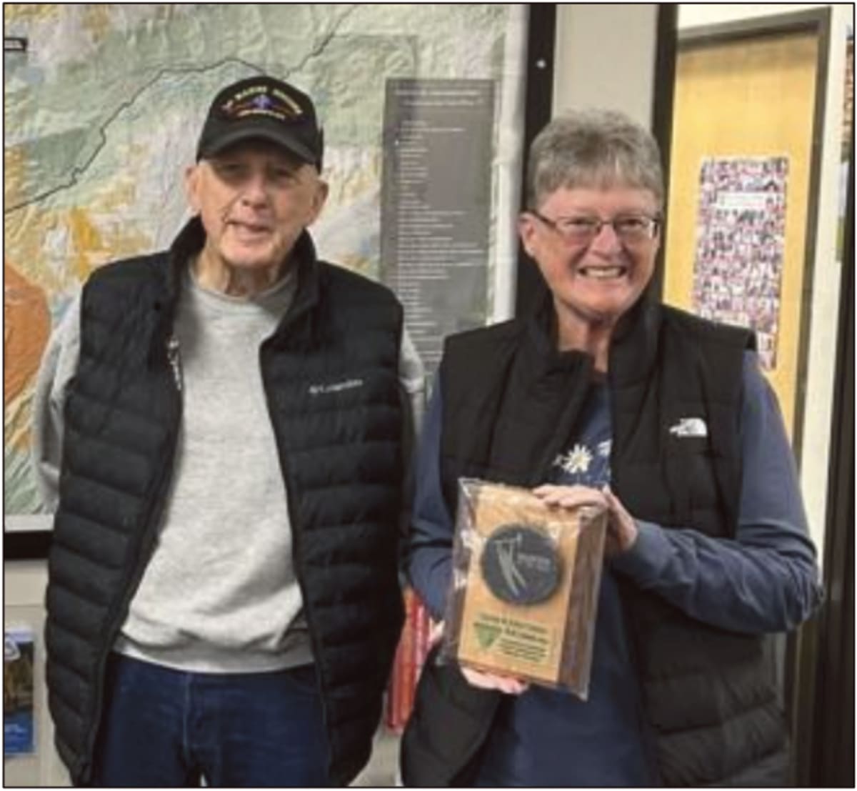 Lynne and John Green holding their BLM Colorado Volunteers of the Year award