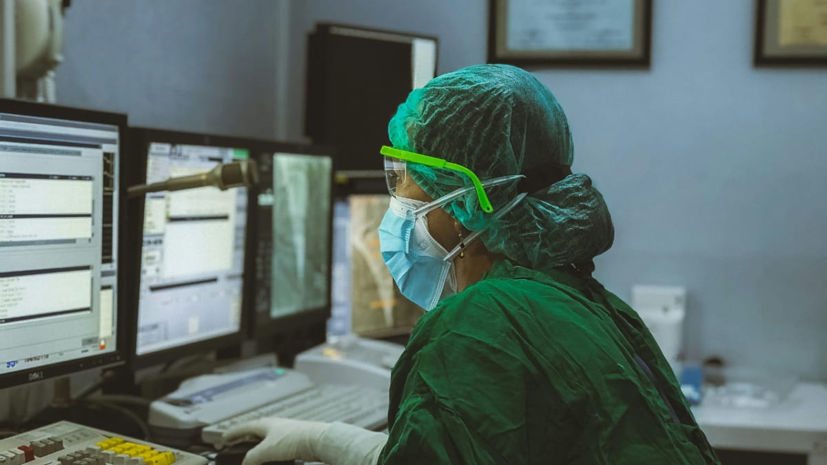 Medical professional preparing personalized cancer vaccine in modern laboratory setting
