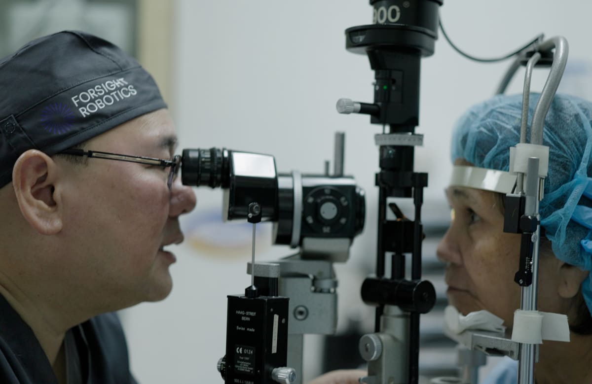 Surgeon using ForSight Robotics JASPER platform to perform precision cataract surgery procedure