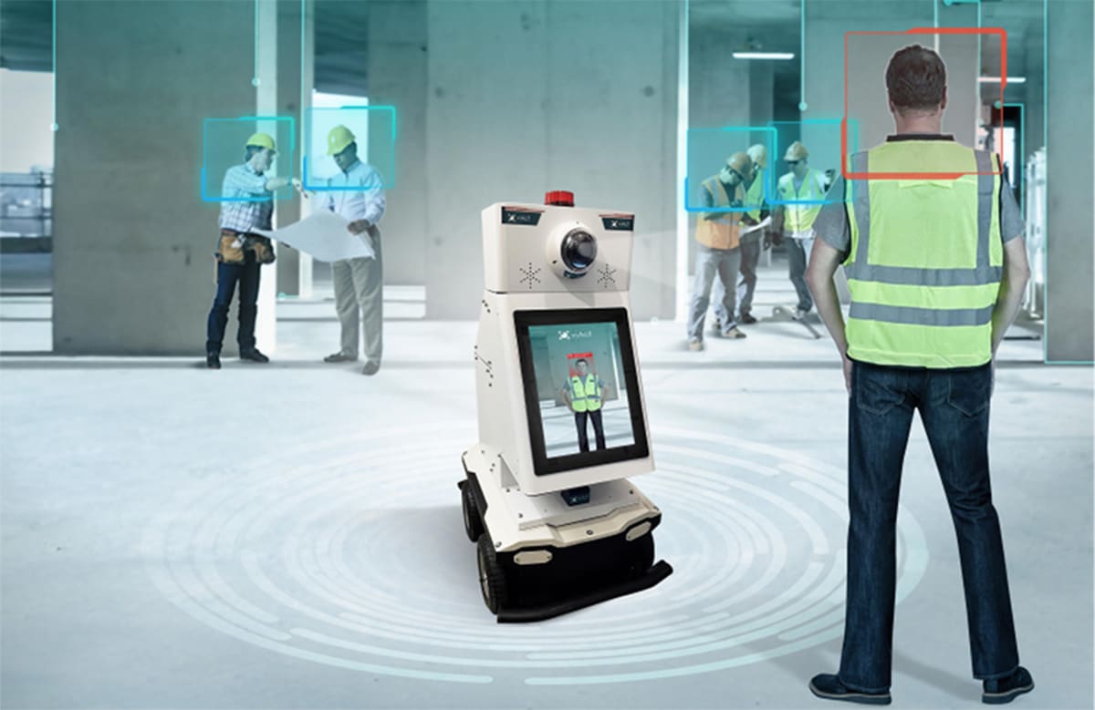 Autonomous construction robot working on job site with vision AI safety monitoring cameras overhead