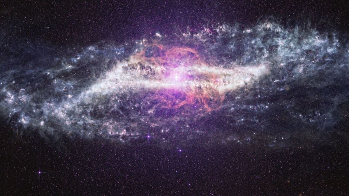 James Webb Space Telescope infrared image revealing bright stars through dust in Centaurus A galaxy center