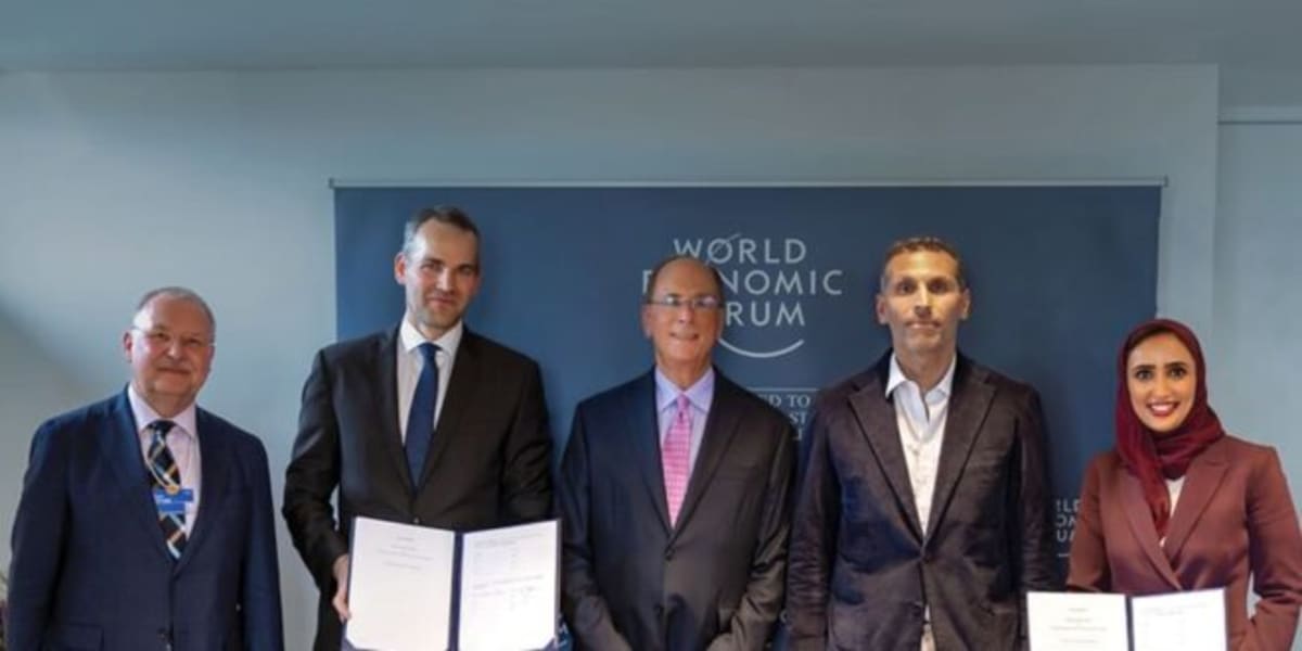 Leaders shaking hands at water innovation partnership signing ceremony between global organizations