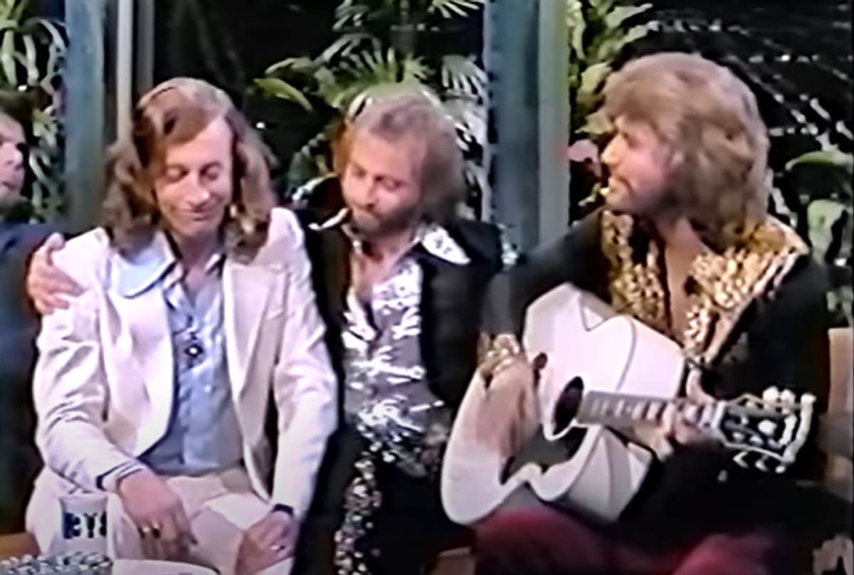 ** The Bee Gees performing with acoustic guitar on The Tonight Show in 1973
