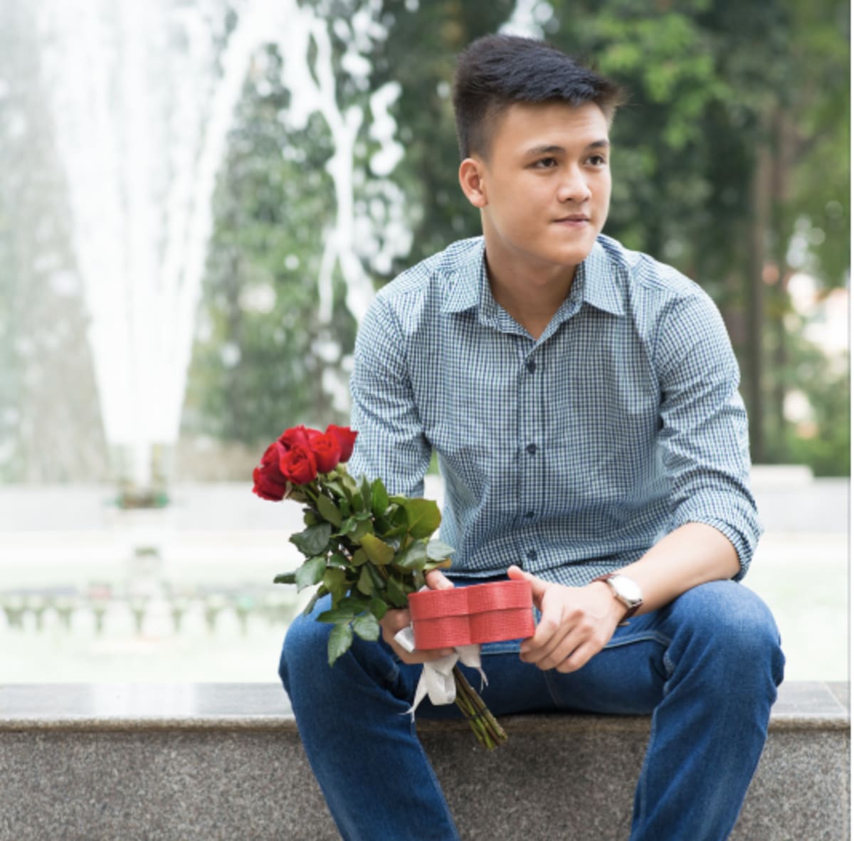 Boyfriend Brings Flowers, Walks Into His Own Surprise Party - Image 2