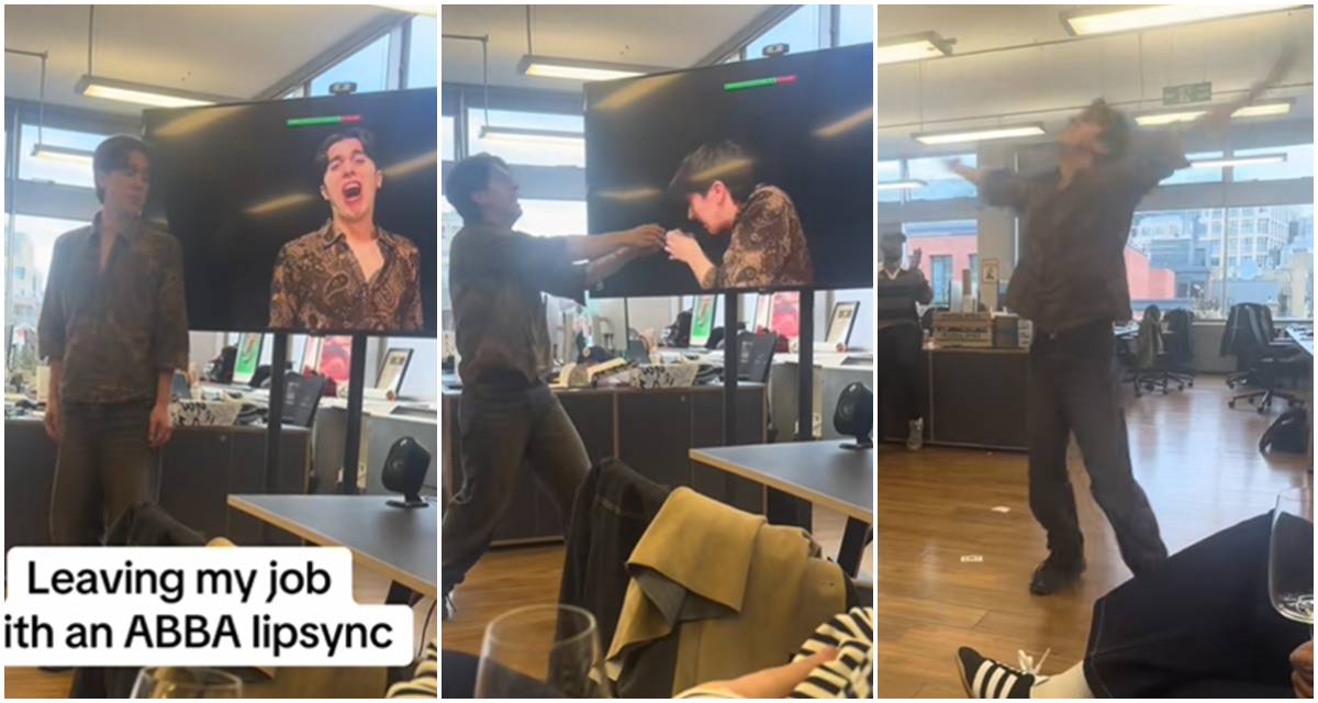 Graphic designer Mati Baran performing lip-sync routine in front of office monitor with colleagues watching