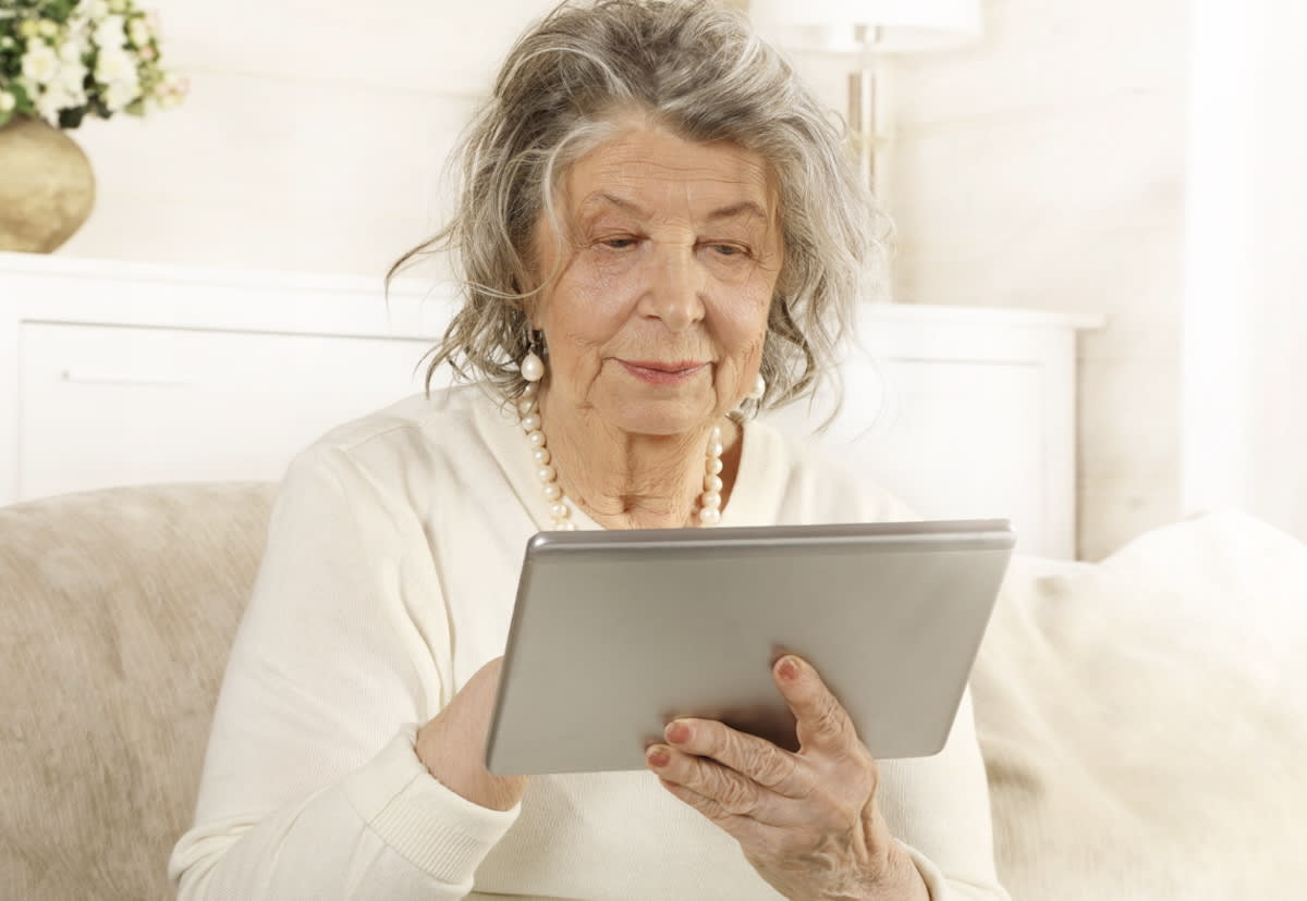 Two generations holding smartphones showing different text messaging styles and communication habits