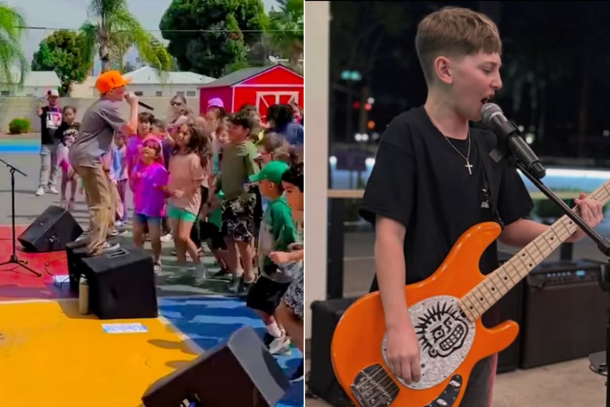 Three young boys playing punk rock instruments at playground with kids moshing nearby