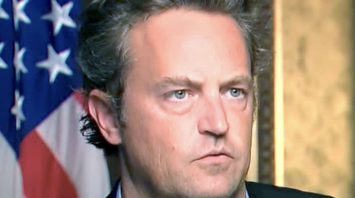 Matthew Perry smiling warmly, remembered for privately helping people through addiction struggles