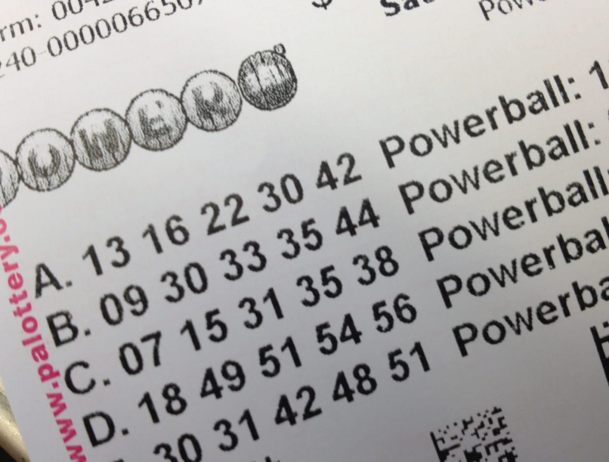 Two older Wisconsin friends celebrating lottery winnings together after keeping 28-year handshake promise