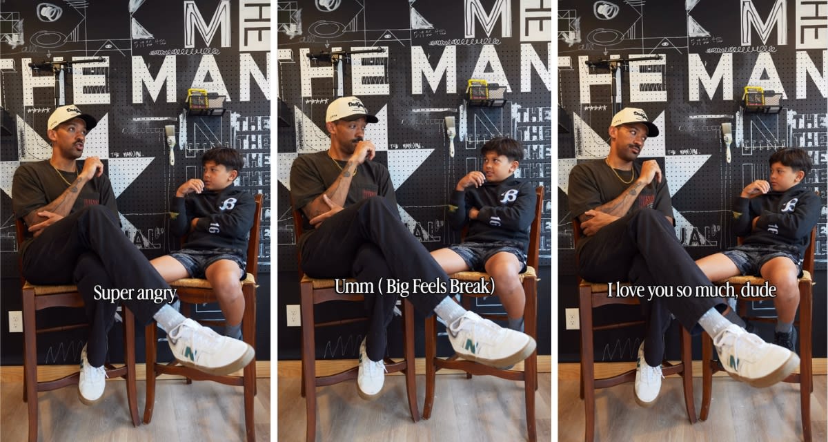 Father and young son having serious conversation, demonstrating parental accountability and emotional intelligence