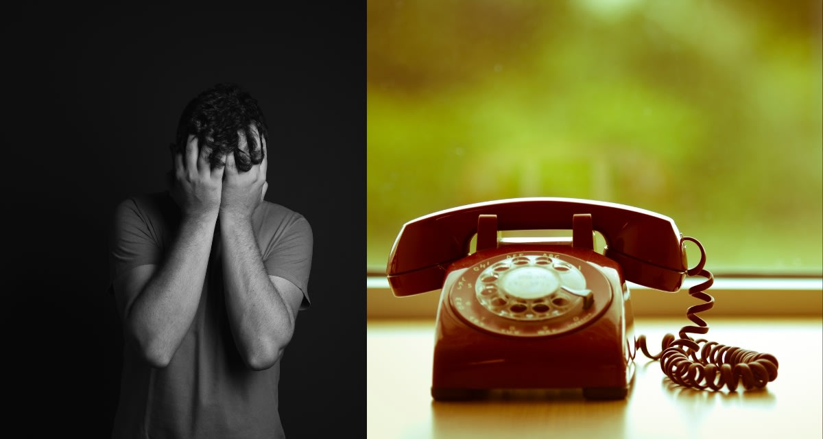 Bright red telephone on table with sign inviting strangers to share good news