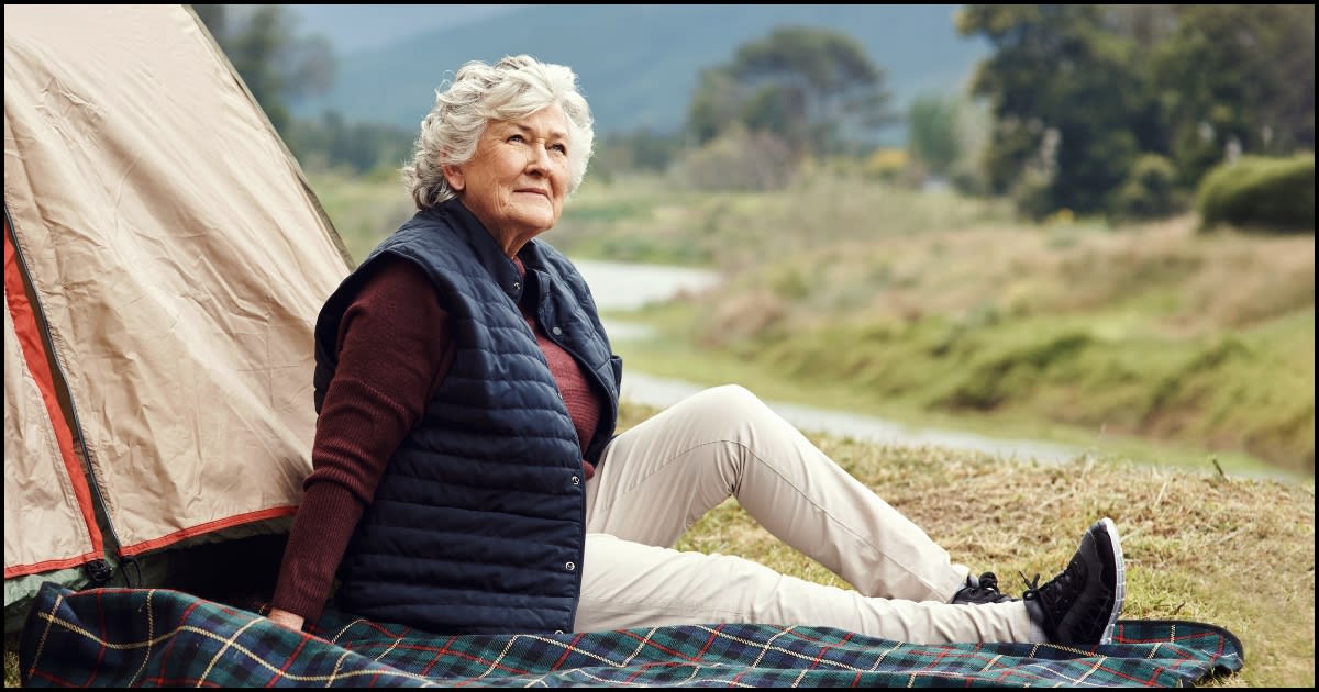 77-year-old woman Wendy Eden camping solo with tent and dog in British Columbia forest