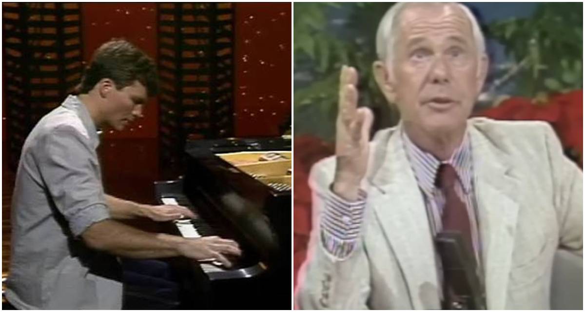 Young man in casual T-shirt playing grand piano on The Tonight Show stage in 1985