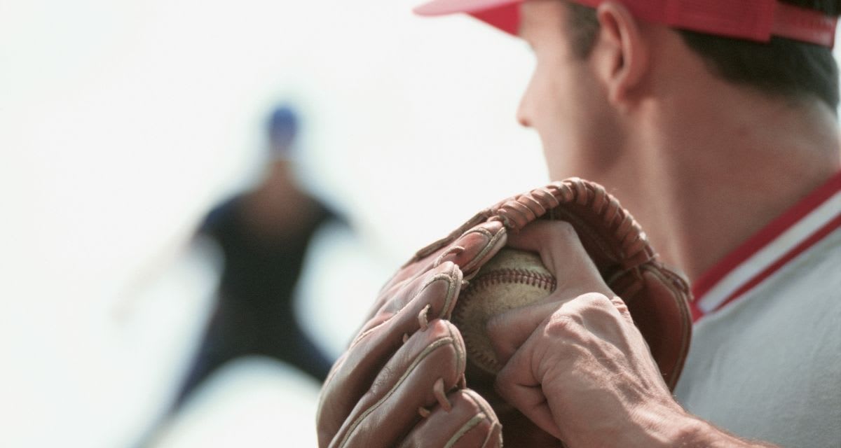 Boston Red Sox pitcher Payton Tolle on the mound wearing his glove inscribed with tribute to mother